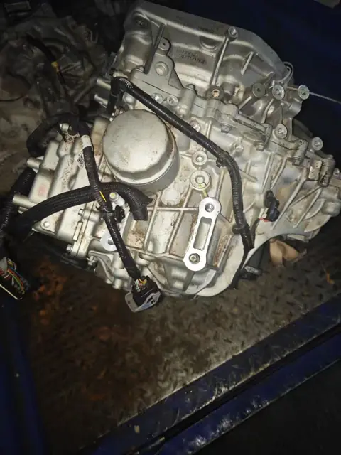 Transmission assembly with harness